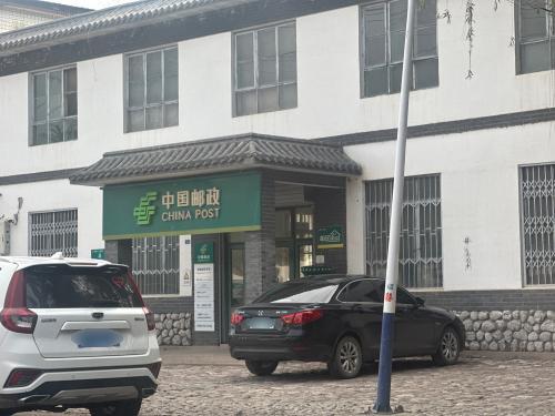 中国邮政三农服务站(南障城镇人民代表大会西北)